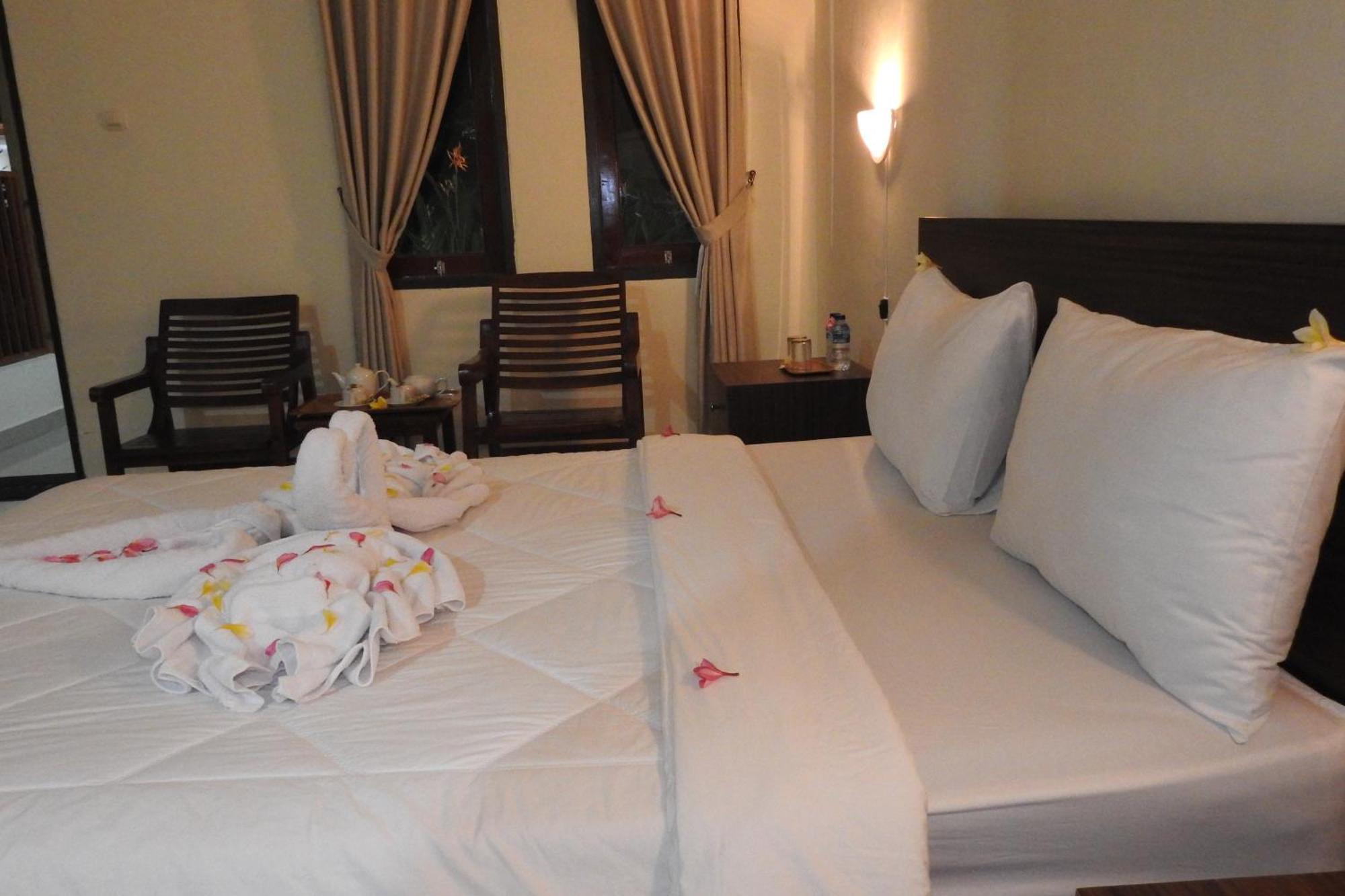 D'Batur Hotel Senggigi Habitación foto